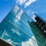 Commercial exterior building looking up at blue sky