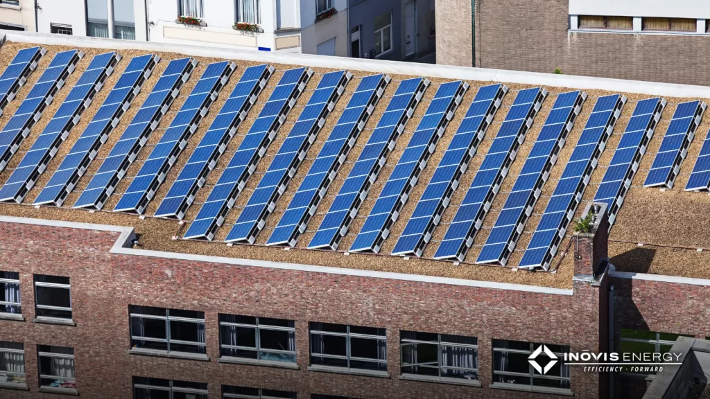 red brick commercial building with solar panels on rooftop